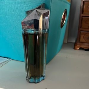 Angel perfume in a refillable bottle by Thierry Mugler.